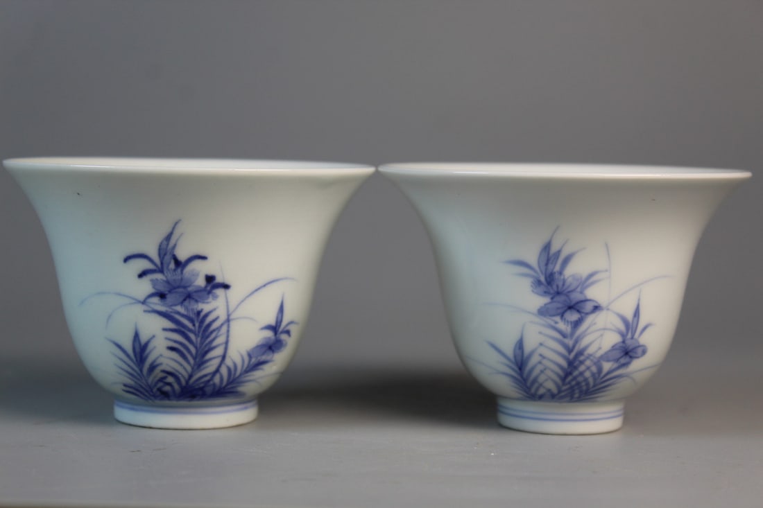 Pair of Chinese Blue and White Porcelain Cups: Pair of Chinese Blue and White Porcelain Cups. H 2.75". Diam 3.5".