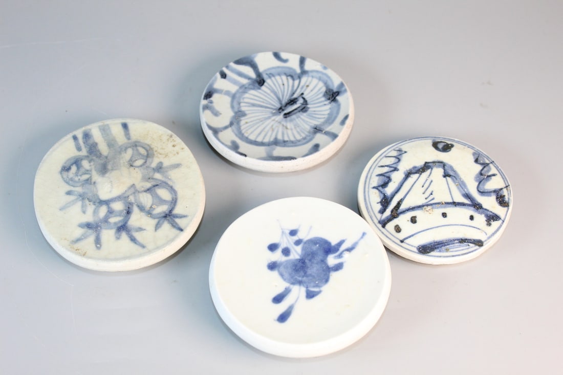 Four Chinese Blue and White Porcelain Stands: Four Chinese Blue and White Porcelain Stands. Largest diam 4".