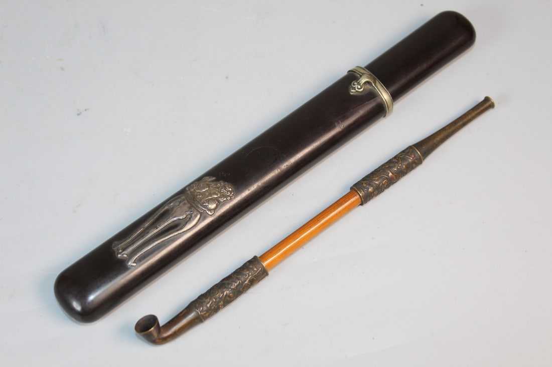 Japanese Black Lacquer Kiseru with Pipe: Japanese Black Lacquer Kiseru with Pipe. Silver decoration of a fu dog on a table. L 9.5".