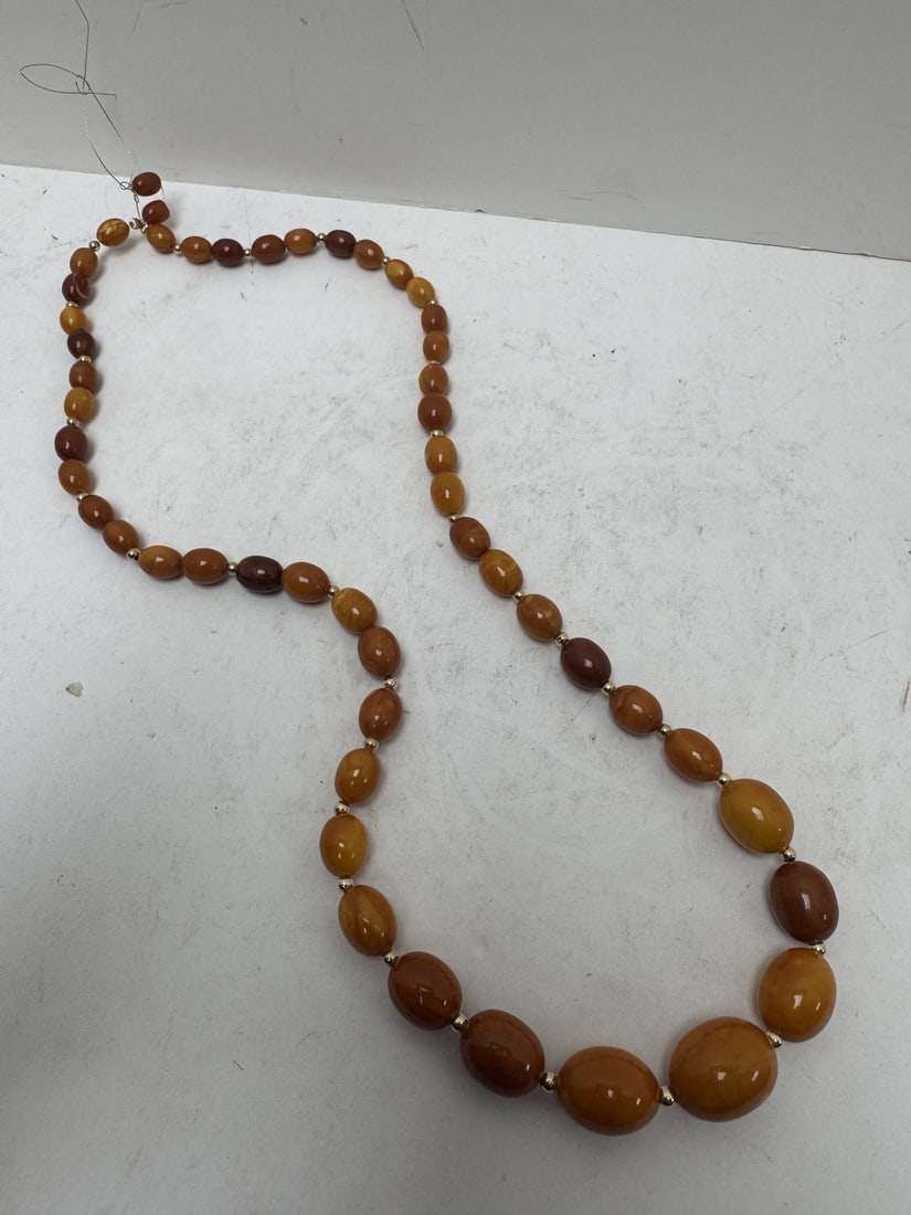 Amber Butterscotch necklace with 14K gold beads: Amber Butterscotch necklace with 14K gold beads. Length 30"