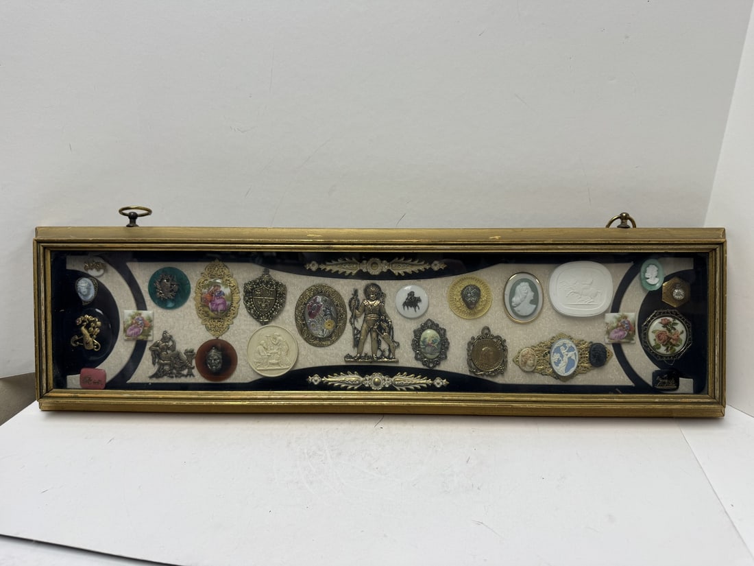 Framed Medallaions, pins, broches, miniature plaques: Framed Medallaions, pins, broches, miniature plaques. Framed size 7.75" x 28.25"