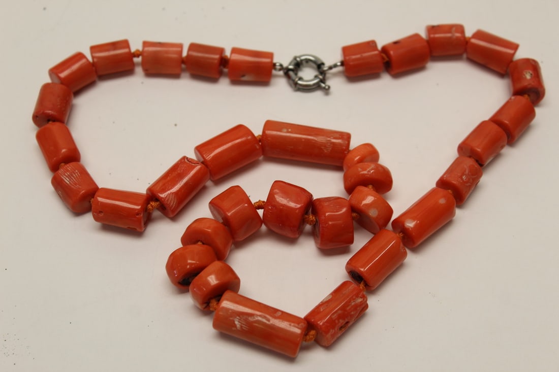 Red coral necklace: Red coral necklace. Length 24" largest bead length 1.125"