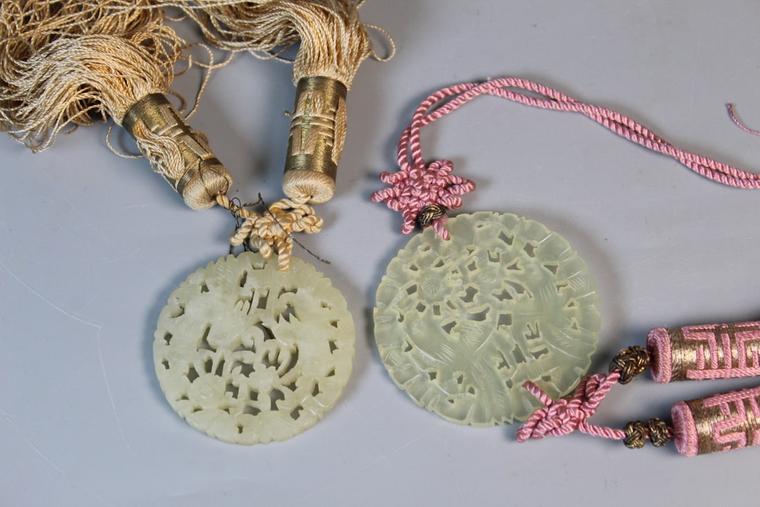 Two Chinese Carved Jade Pendants: Two Chinese Carved Jade Pendants. Diam 2.25".