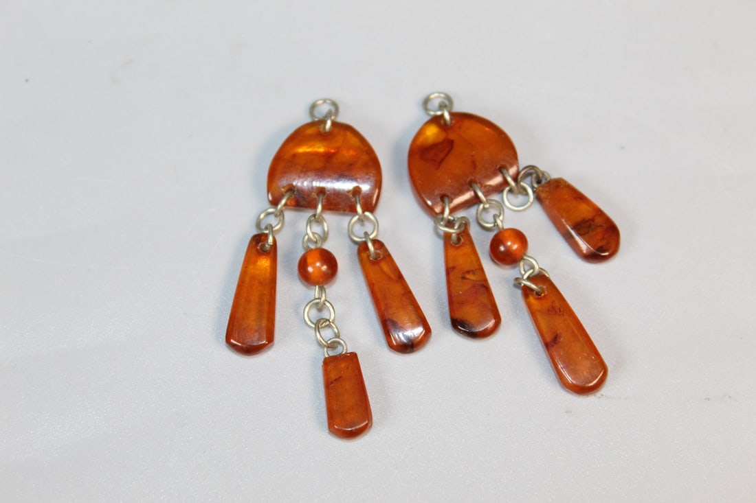 A Pair of Amber Earrings: A Pair of Amber Earrings. L 2", As Is.