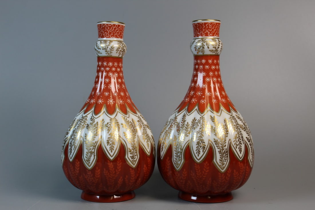 A Pair of Limoges Porcelain Vases: A Pair of Limoges Porcelain Vases. H 9", Diam 4.75".