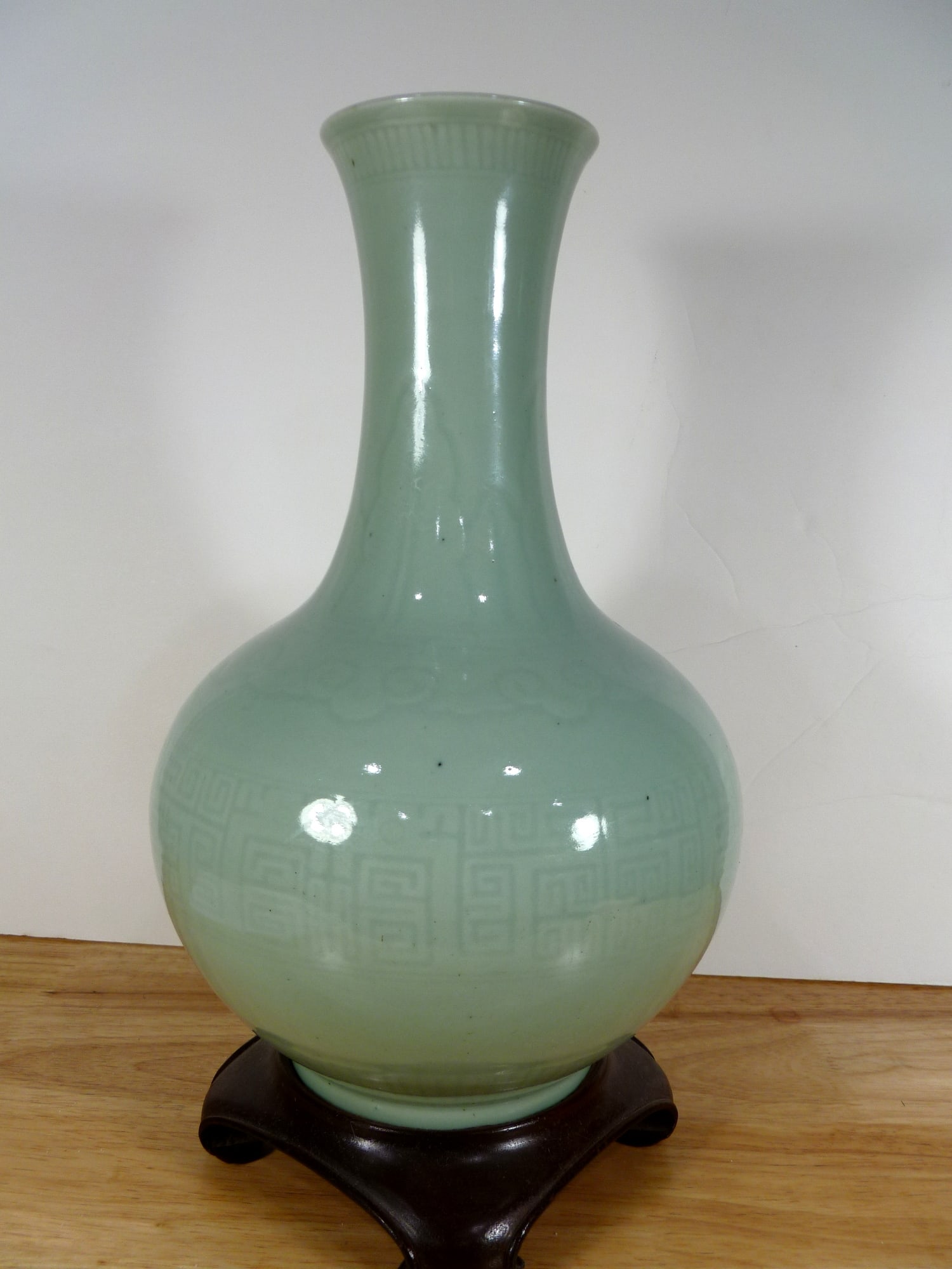 Chinese Celadon Porcelain Vase on Wood Stand, Qianlong Mark: Chinese Celadon Porcelain Vase on Wood Stand, Qianlong Mark. Vase H 12.5". Total height with stand 14".