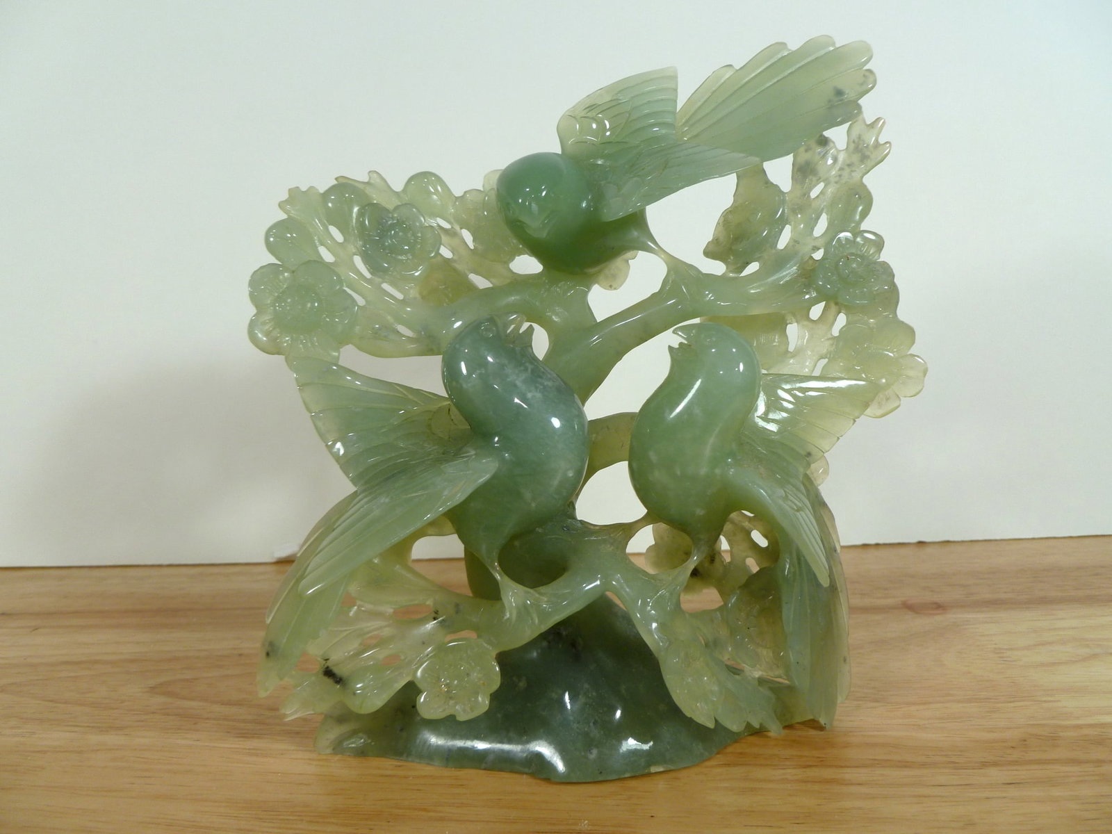 Chinese Carved Serpentine Jade Figure with Bird and Floral Decoration: Chinese Carved Serpentine Jade Figure with Bird and Floral Decoration. H 7". L 6.5".