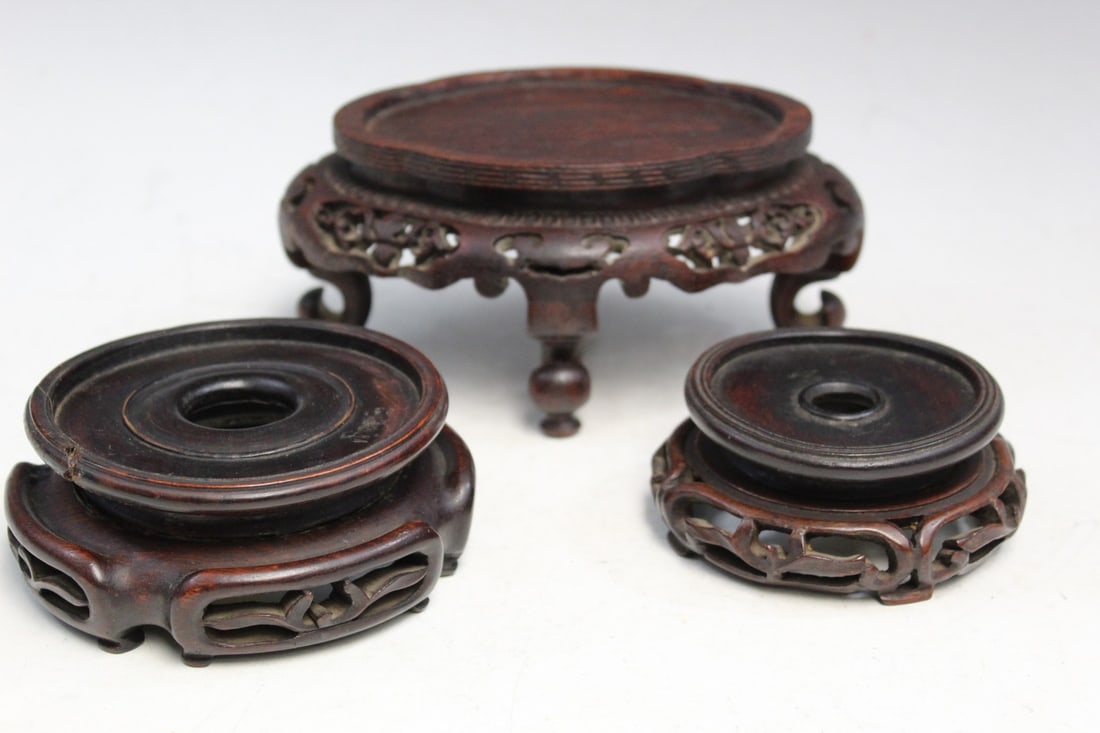 Three Chinese Carved Wood Stands: Three Chinese Carved Wood Stands. Inner rim diam 5" and 3.5".
