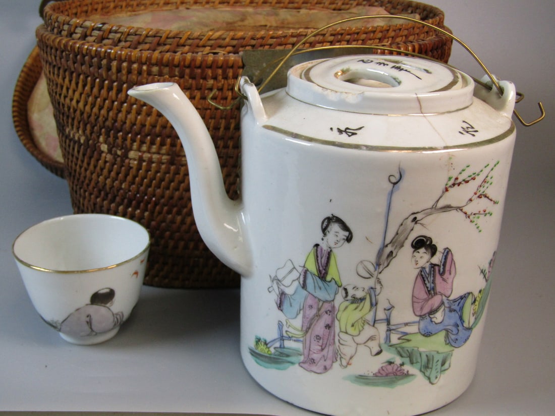Chinese Porcelain Set in a Bamboo Basket: Chinese Porcelain Set in a Bamboo Basket. Teapot L 7". Basket 11x8x7". As Is.