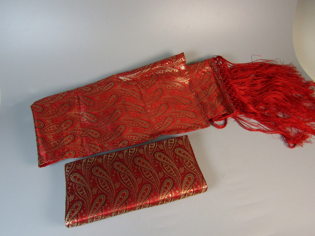 A Red Scarf and A Matching Bag: A Red Scarf and A Matching Bag. 72x11".