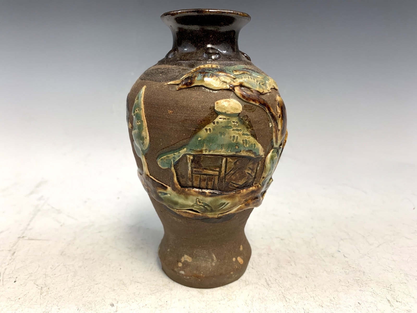 Japanese pottery vase. (1 of 4)