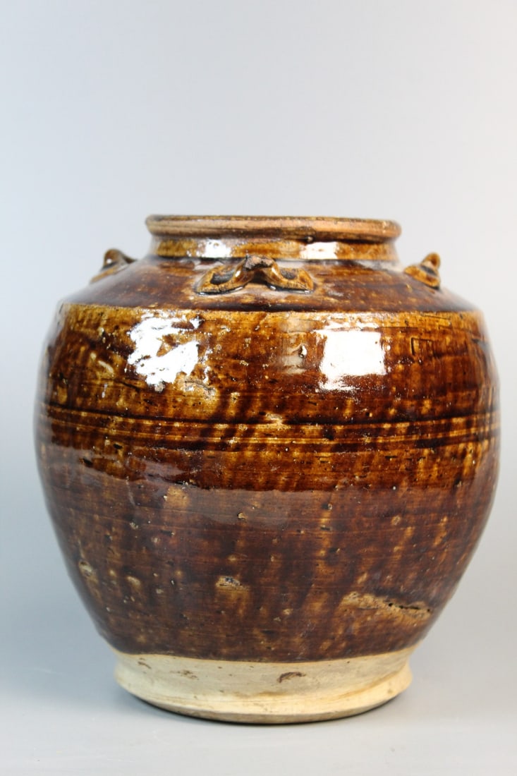 Antique Chinese Brown Glazed Pottery Jar: Antique Chinese Brown Glazed Pottery Jar. H 7', Diam 6.5".