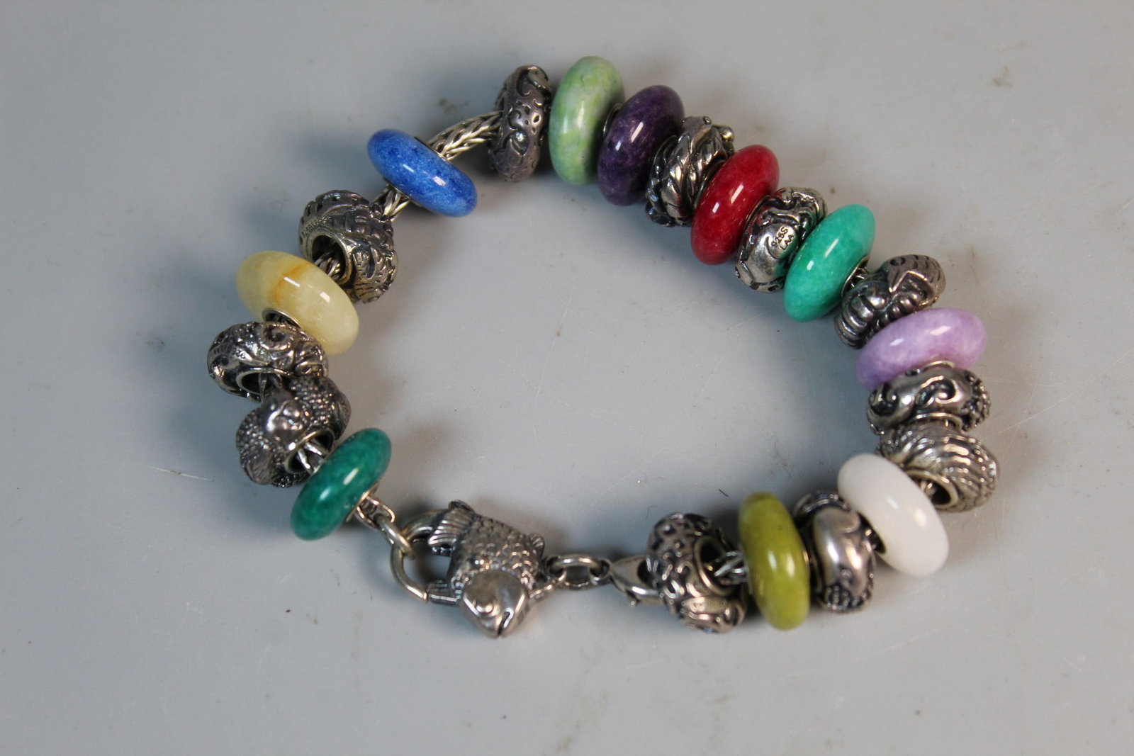 Silver and Glass Beads Bracelet: Silver and Glass Beads Bracelet. L 7.75".