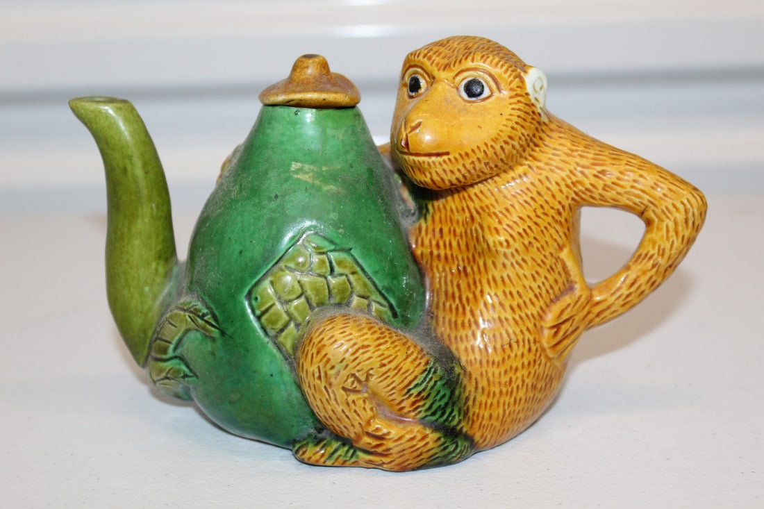 Chinese Monkey Shaped Pottery Teapot: Chinese Monkey Shaped Pottery Teapot. H 4.75". L 8".