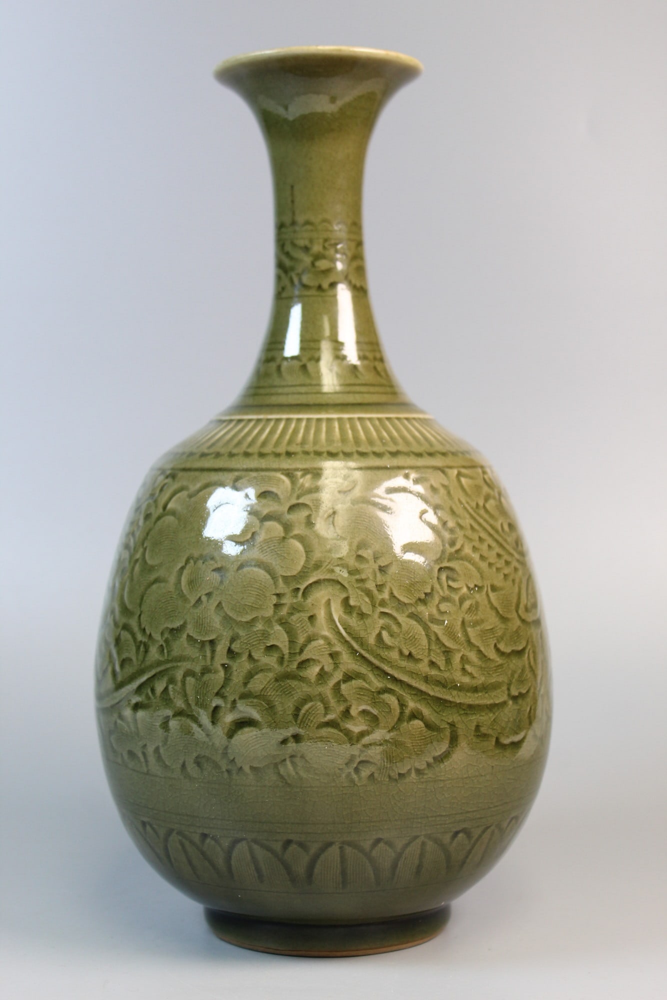 Chinese Carved Celadon Glaze Porcelain Vase: Chinese Carved Celadon Glaze Porcelain Vase. H 12".