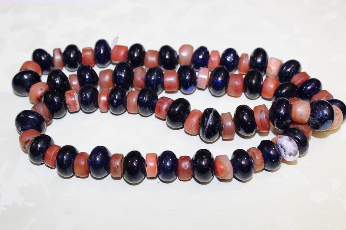 Red Agate and Dark Blue Glass Beads Necklace: Red Agate and Dark Blue Glass Beads Necklace. L 28", Largest Bead diam 0.75".