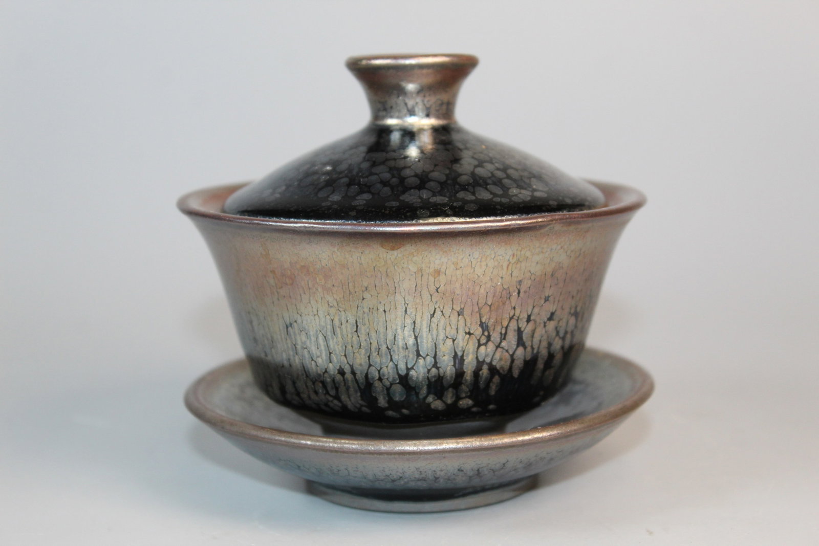 Chinese Jian Ware Tea Cup and Holder: Chinese Jian Ware Tea Cup and Holder. Diam 4".
