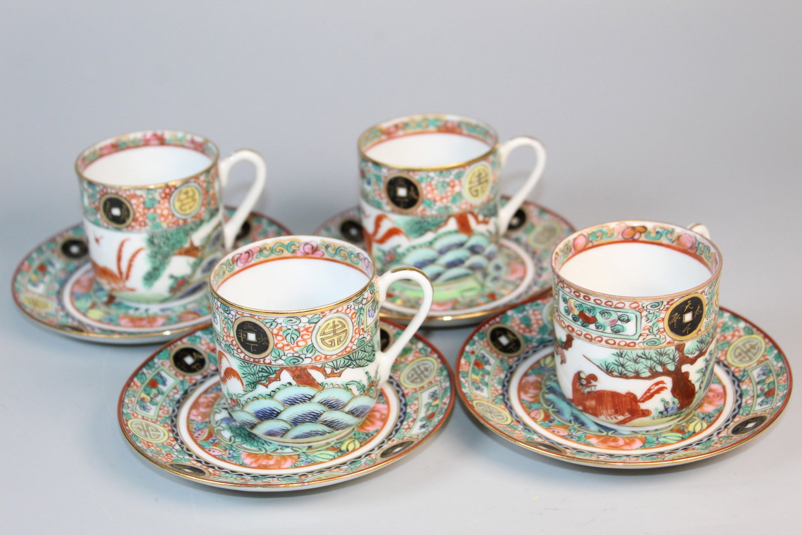 A Set of Four Chinese Rose Medallion Porcelain Tea Cups and Saucers: A Set of Four Chinese Rose Medallion Porcelain Tea Cups and Saucers. Saucer diam 4.5".