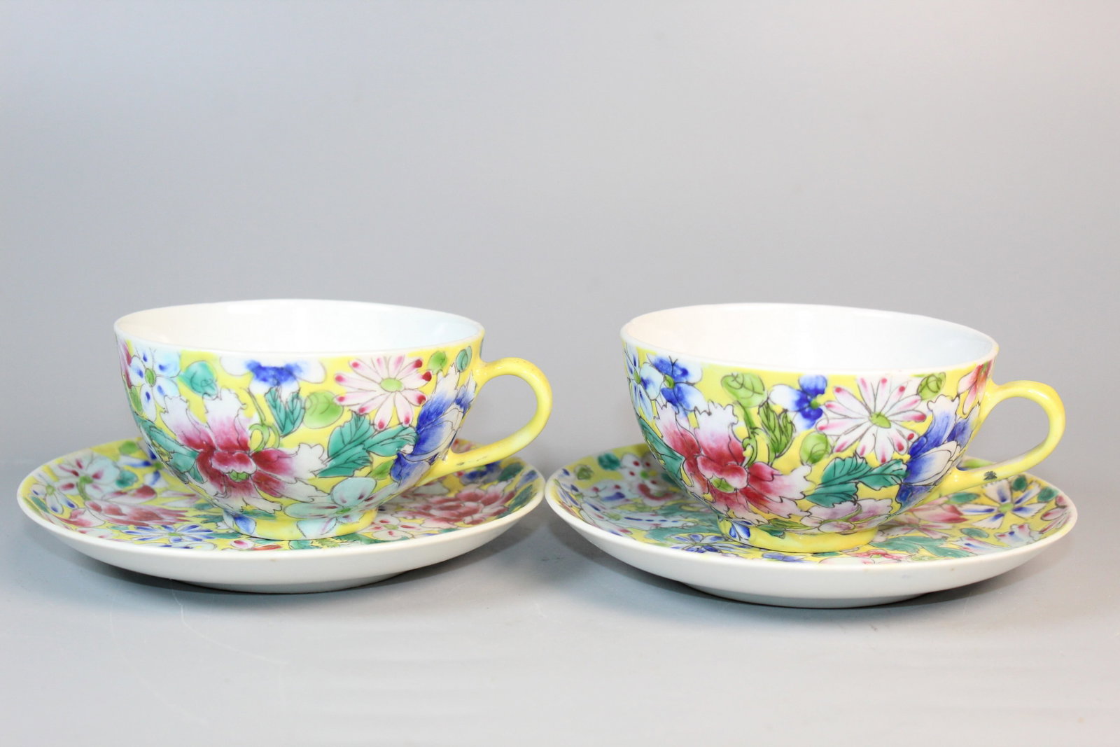 Two Pair of Chinese Yellow Ground Famille Rose Porcelain Tea Cups and Saucers (1 of 9)