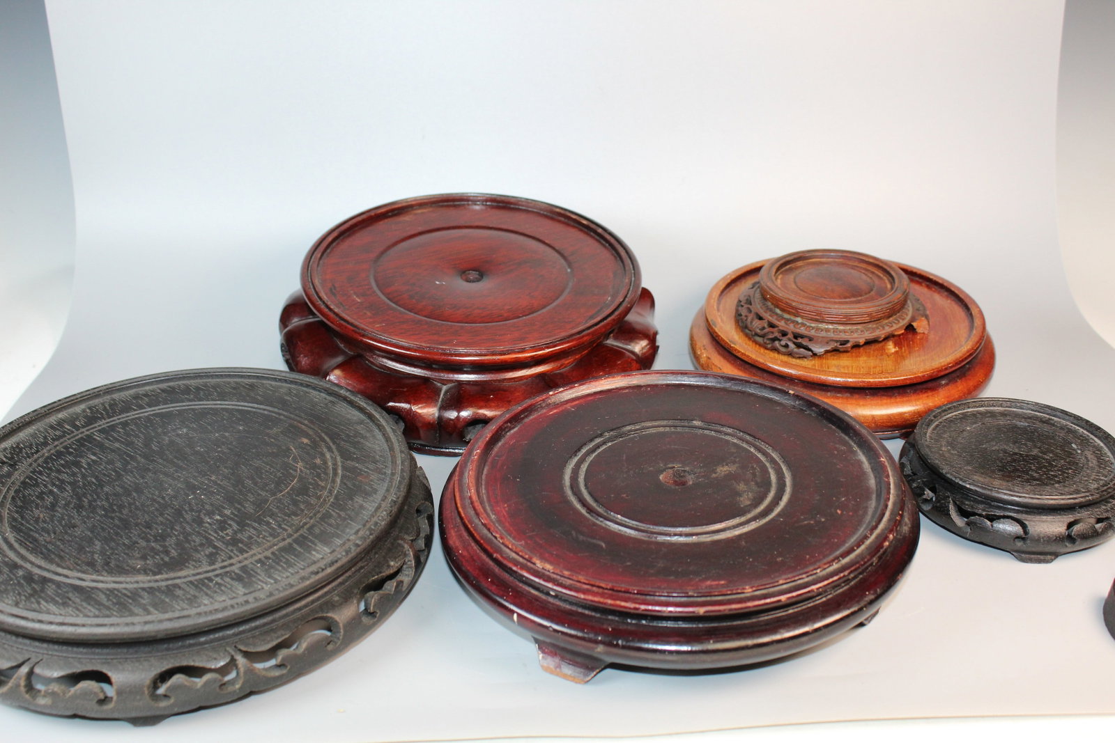 A Group of Large Wood Stands: A Group of Large Wood Stands. Largest Inner Rim Diam 8".