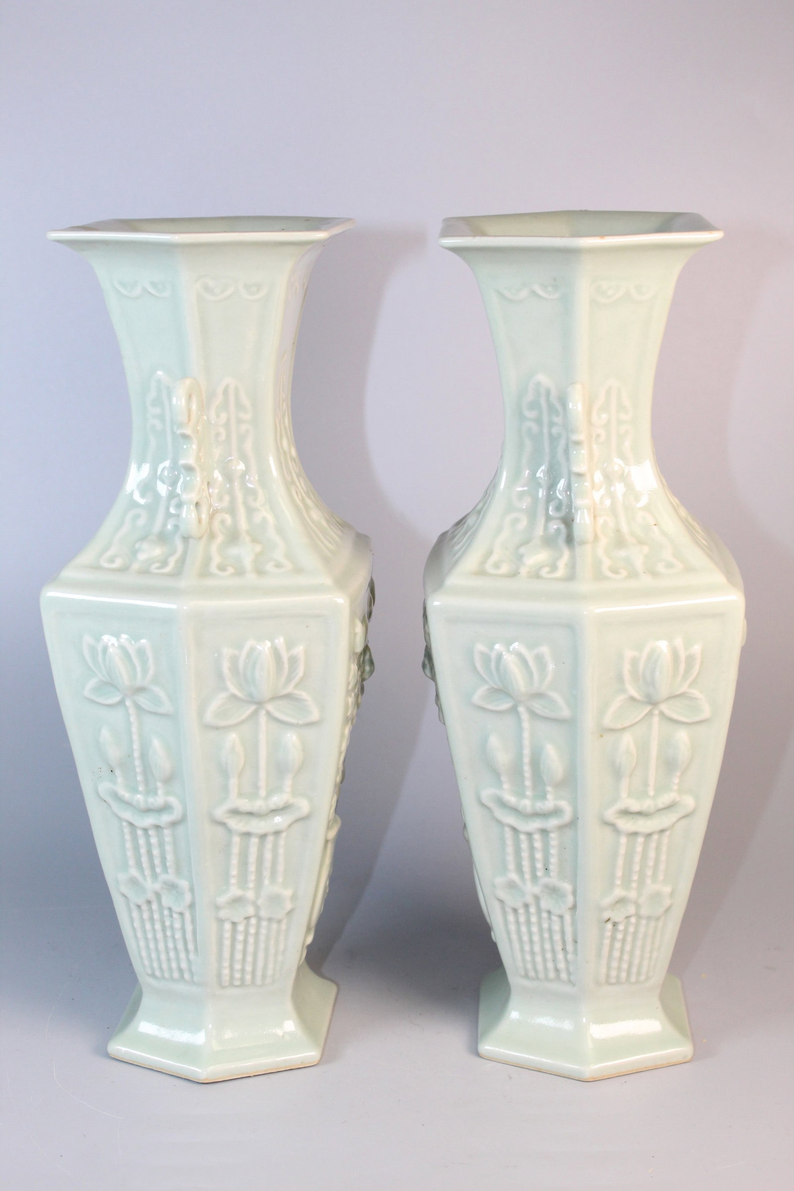 A Pair of Chinese Celadon Glazed Porcelain Vases: A Pair of Chinese Celadon Glazed Porcelain Vases. H 12".