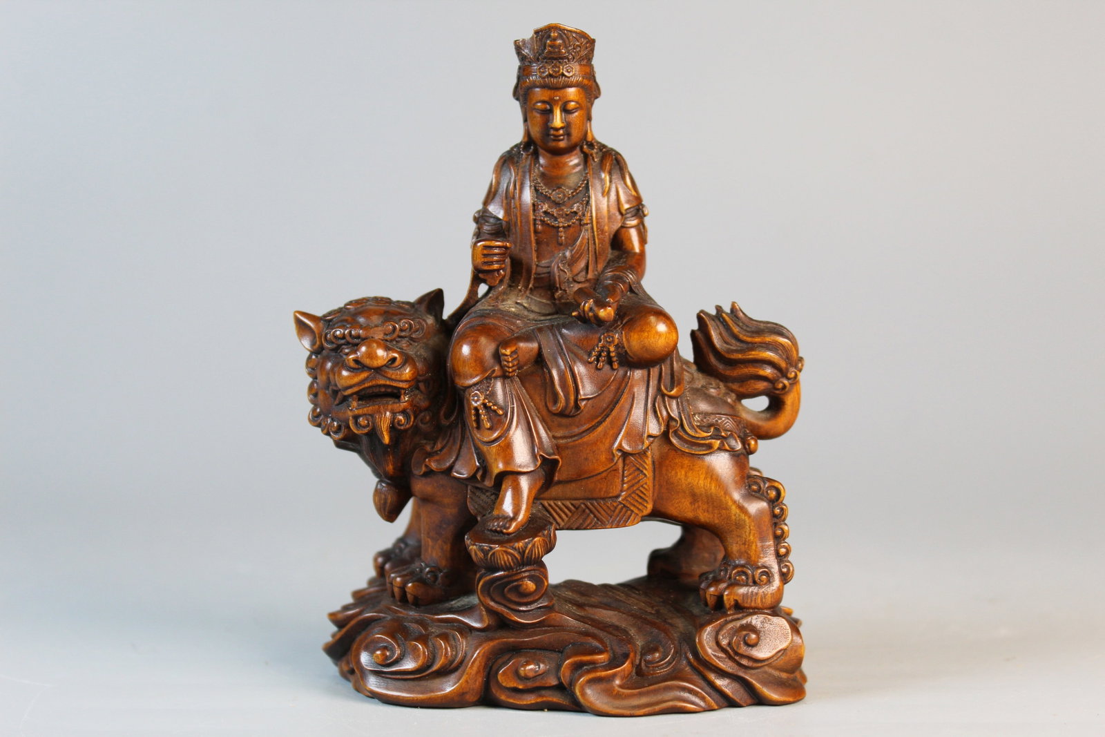 Chinese Wood Guanyin on Lion Figure: Chinese Wood Guanyin on Lion Figure. H 4.5".