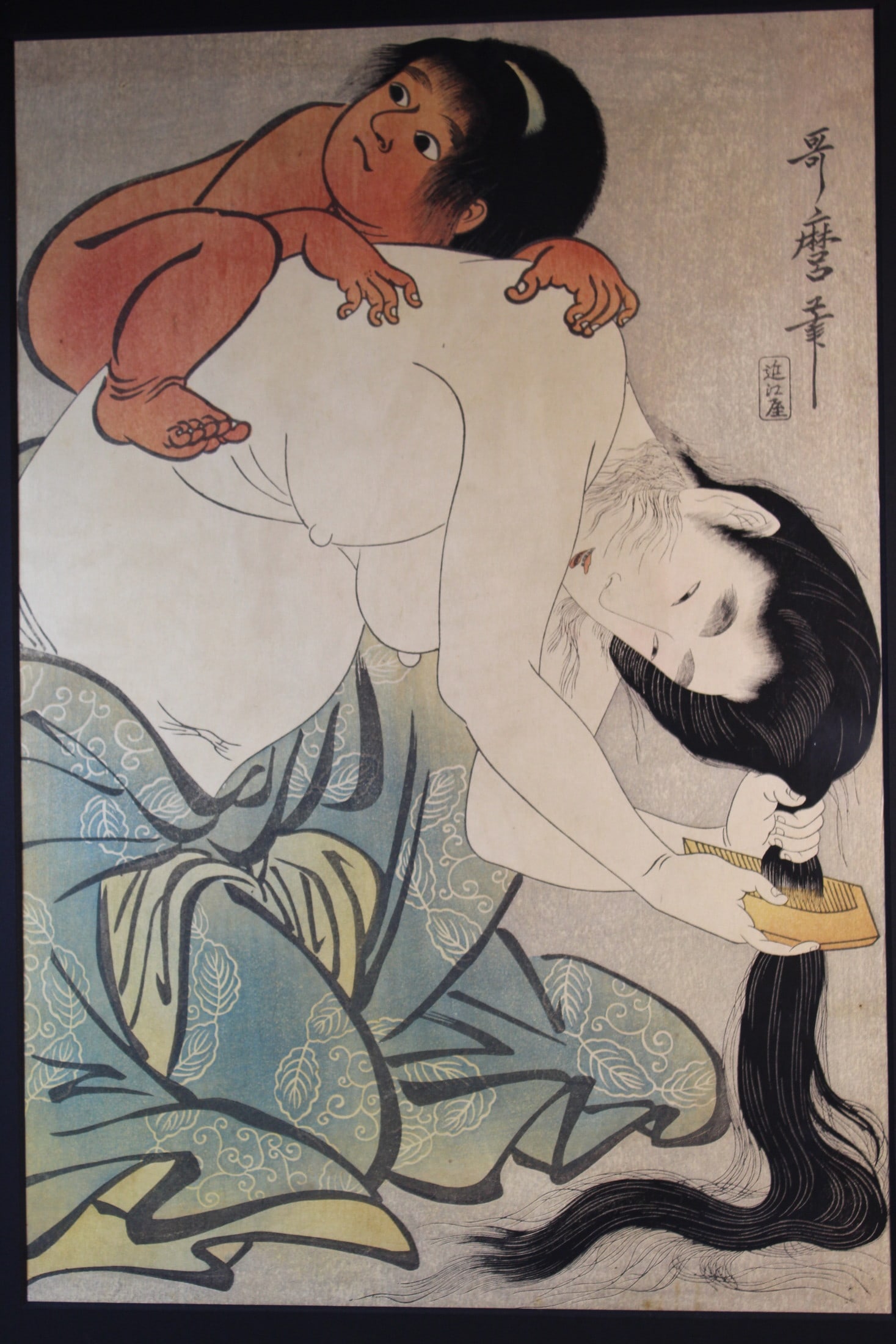 Yamauba Combing Her Hair and Kintoki, Kitagawa Utamaro, Japanese Woodblock Print.: Yamauba Combing Her Hair and Kintoki, Kitagawa Utamaro, Japanese Woodblock Print.. 15.25x10.25" Published by Enji Takamizawa.