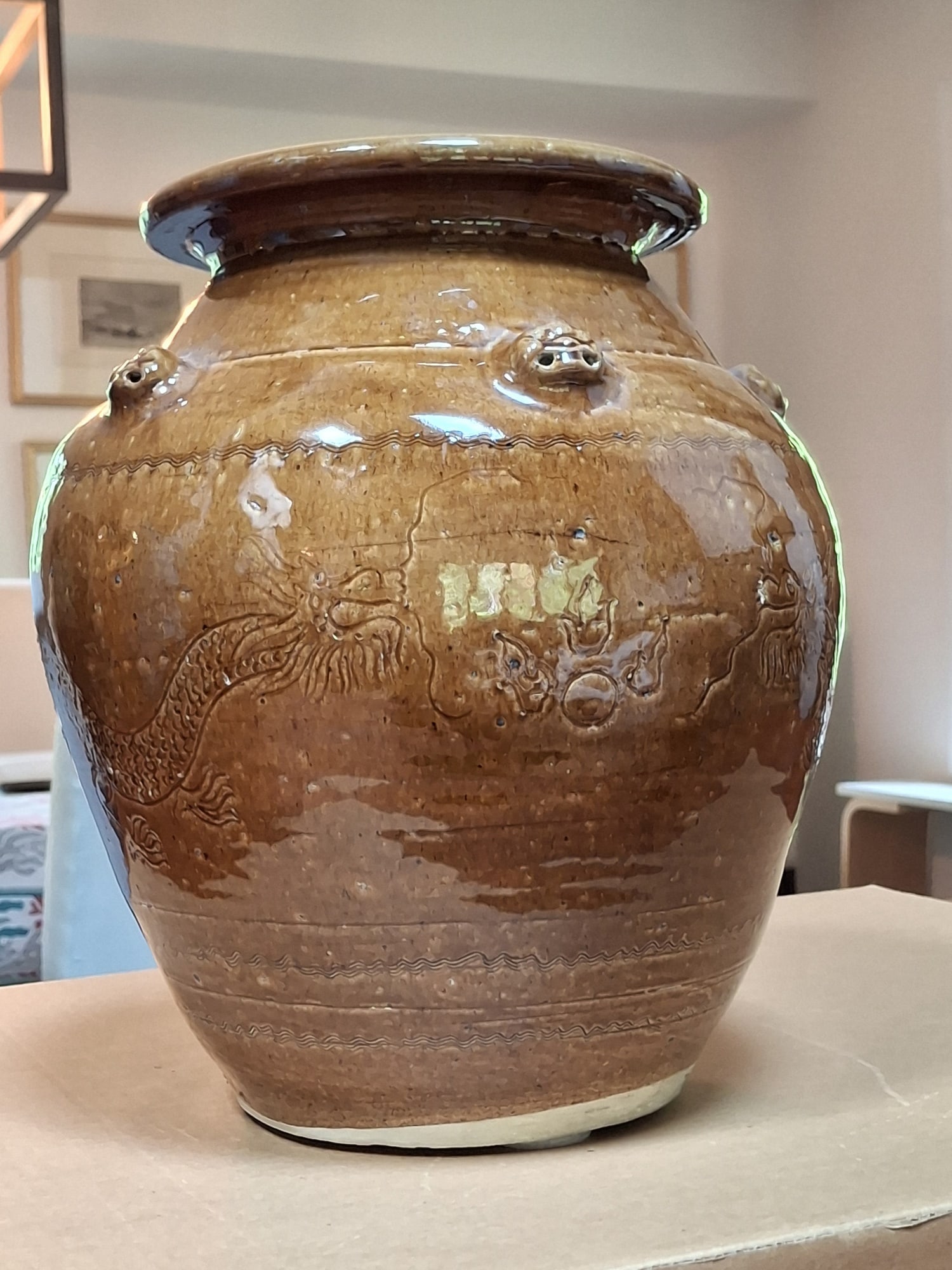 Chinese Brown Glazed Pottery Jar: Chinese Brown Glazed Pottery Jar. H 12". Diam 12".