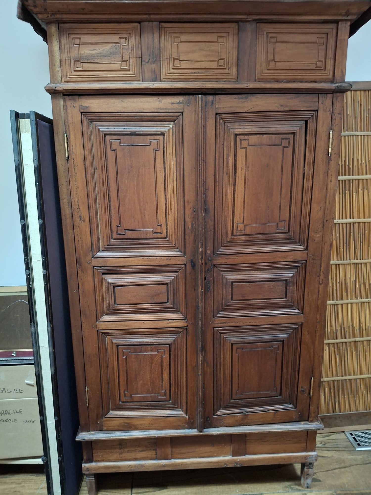 Antique Paneled Armoire.: Antique Paneled Armoire.. 47x42.5x22.25". Contents are not included. Attention: The pickup location of this item is at Crownsville, MD 21032. Winning bidder will get address and pickup time through