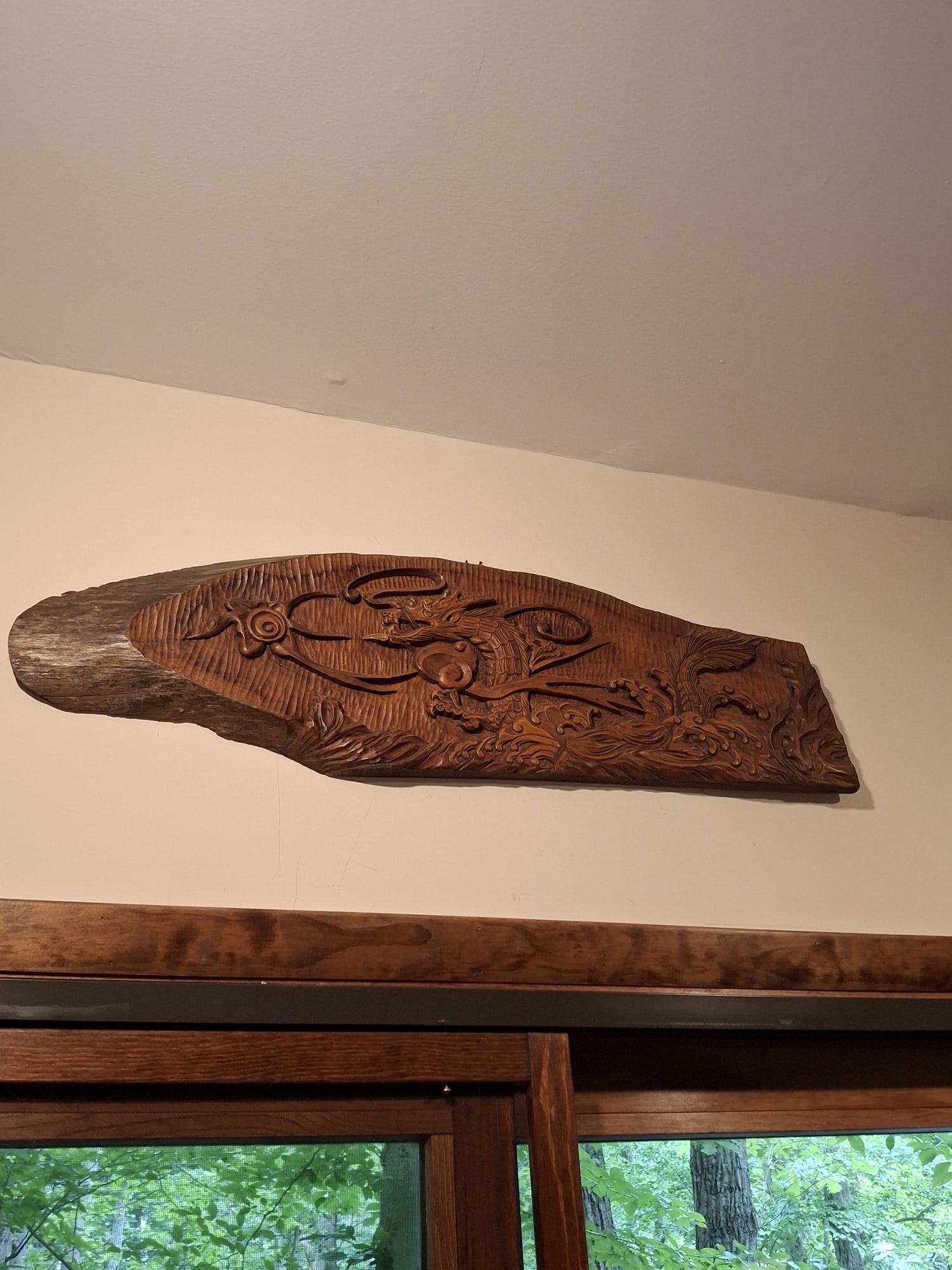 Carved Wood Dragon Wall Plaque: Carved Wood Dragon Wall Plaque. L 36". Attention: The pickup location of this item is at Crownsville, MD 21032. Winning bidder will get address and pickup time through email. No in-house shipping for