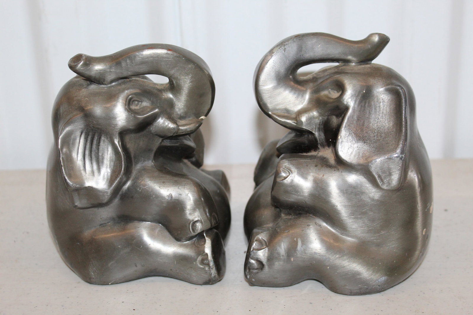A Pair of Pewter Elephant Bookends. (1 of 9)