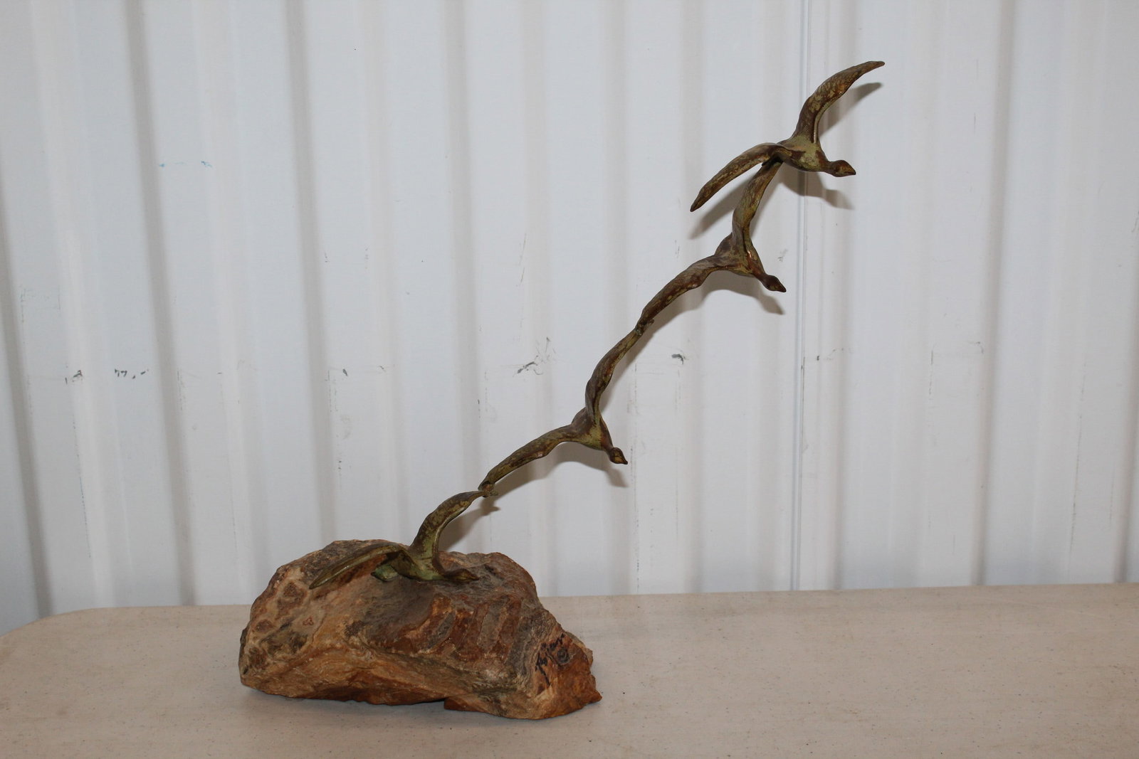 Bronze Birds in Flight Sculpture on Rock Base. Signed.: Bronze Birds in Flight Sculpture on Rock Base. Signed.. Total H 13".