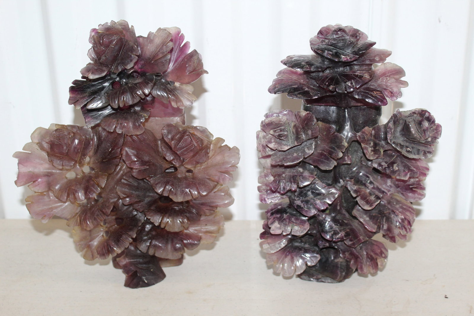 Two Chinese Carved Amethyst Flower Vases: Two Chinese Carved Amethyst Flower Vases. H 10.25".