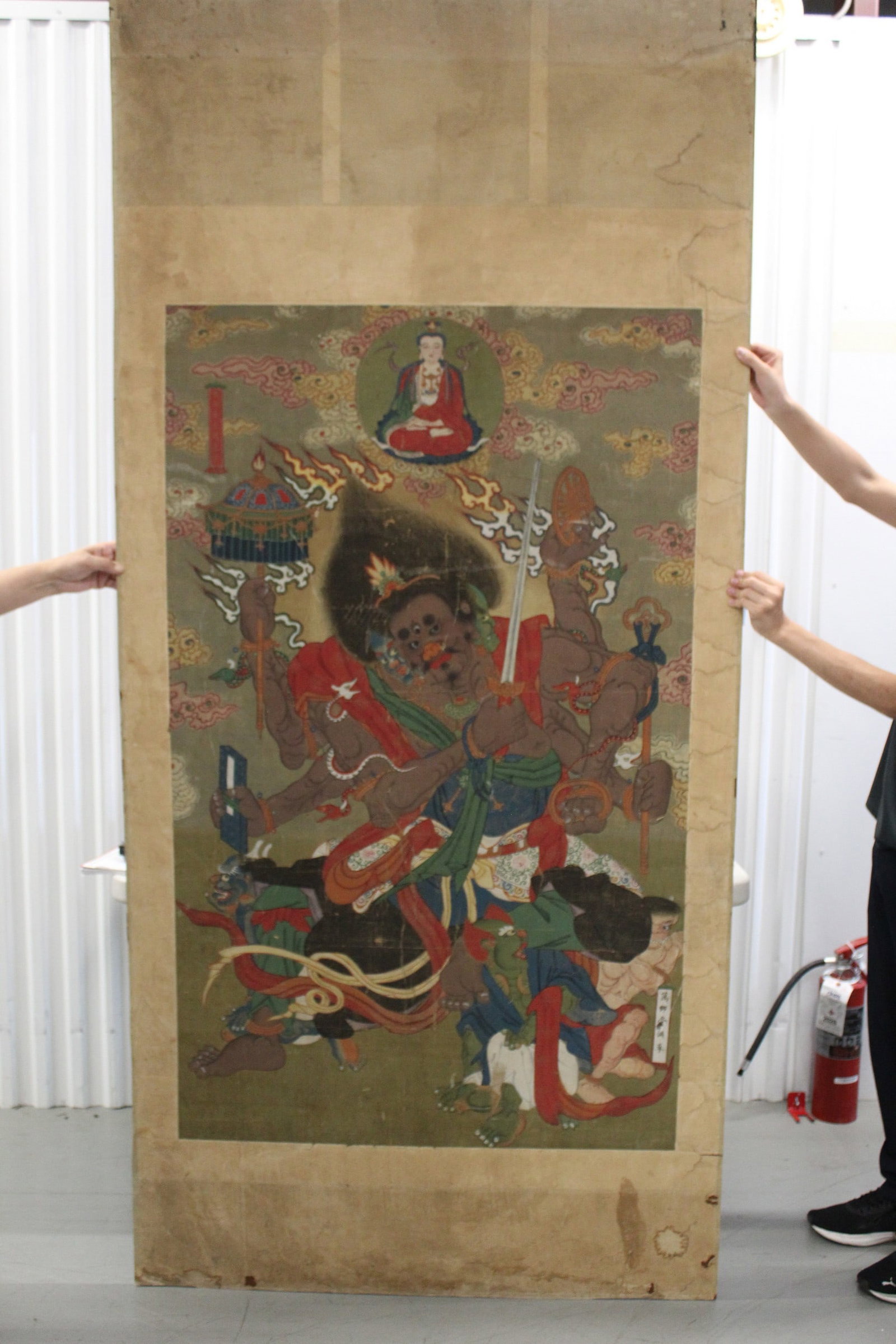 Large Chinese Buddhist Temple Painting on Silk: Large Chinese Buddhist Temple Painting on Silk. 35x57". Mat 90x42". As Is.