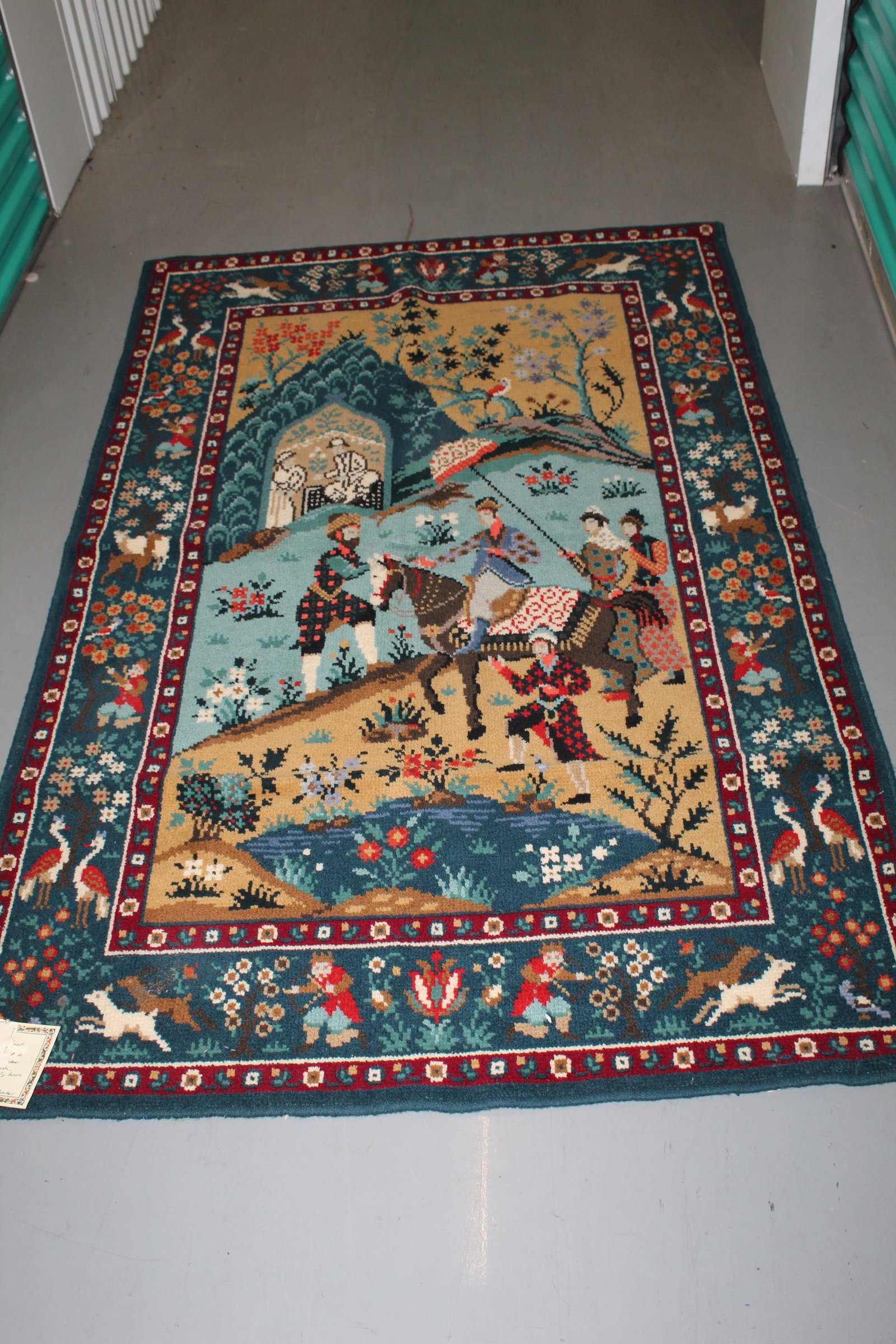 A Persian Wool Rug: A Persian Wool Rug. 44x71".