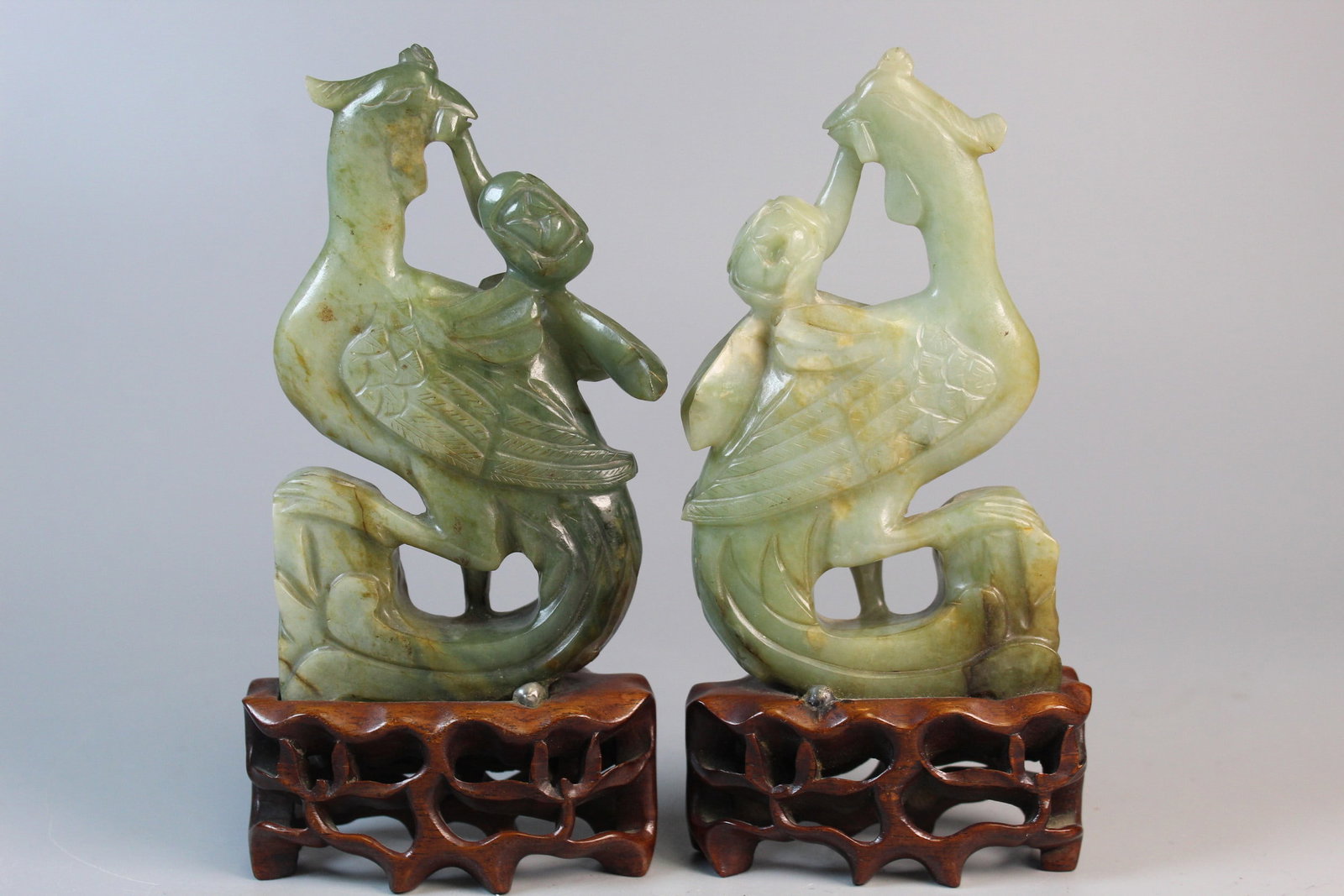 Pair of Chines Carved Celadon Jade Phoenix Figures on Wood Stand: Pair of Chines Carved Celadon Jade Phoenix Figures on Wood Stand. H 5'. Total H 6".