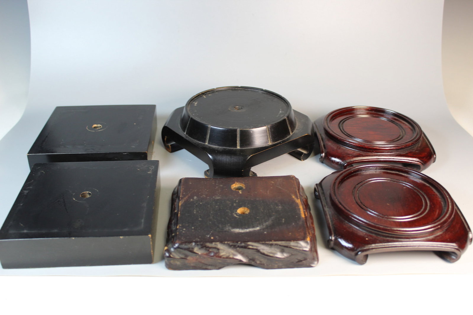 A Group of Wood Stands: A Group of Wood Stands. Largest Inner Rim Diam 5.25".