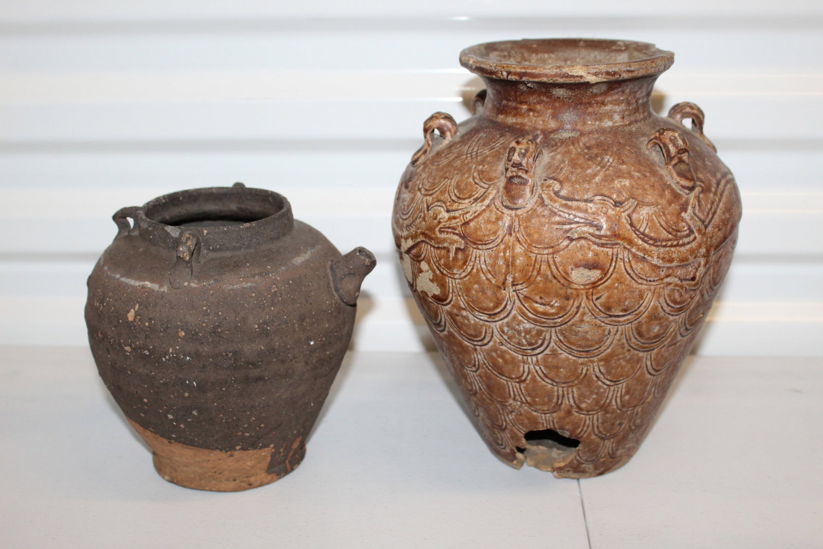 Two Antique Chinese Pottery Jars: Two Antique Chinese Pottery Jars. Larger H 9.5". As Is.