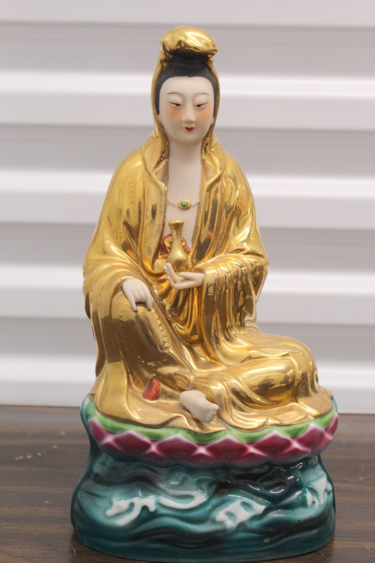 Chinese famille rose porcelain Guanyin statue: Chinese famille rose porcelain Guanyin statue. H 12".