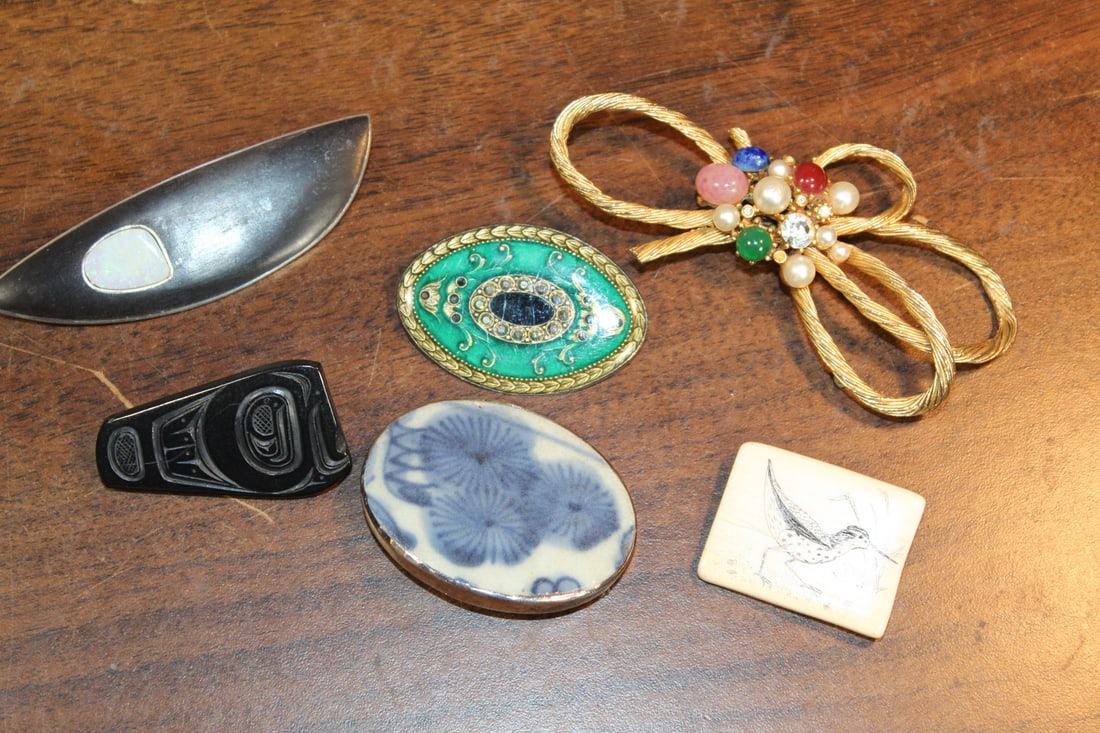 A Group of Brooches: A Group of Brooches. Sterling, Horn and Mother-of-pearl Piece Signed Engstrom L 8 cm; Enamel Oval Signed Catherine Popesco France L 4.5 cm. Black Piece Signed Denny Dixon L 4.5 cm,
