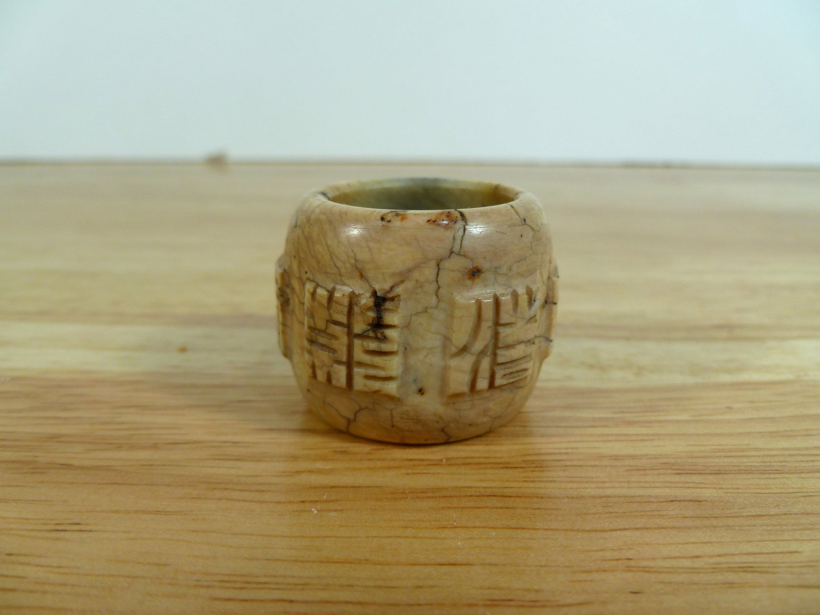 Chinese "Chicken-Bone" Jade Thumb Ring: Chinese "Chicken-Bone" Jade Thumb Ring. H 1". Diam 1.25"