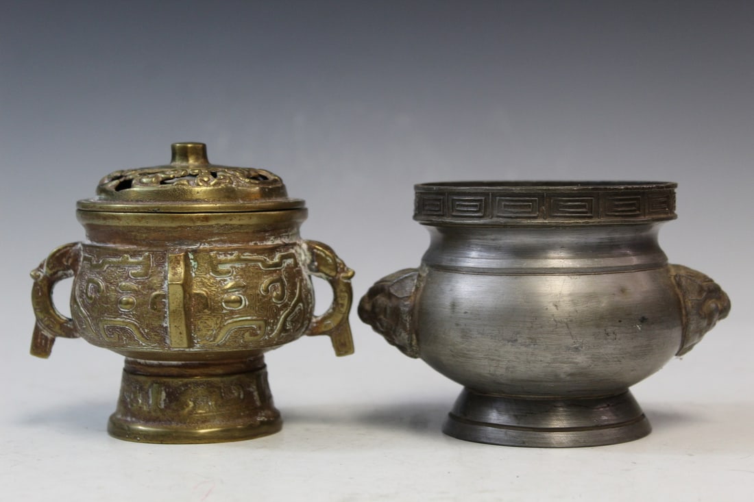 Two Chinese Metal Incense Burners: Two Chinese Metal Incense Burners. Larger piece Length 5.5".
