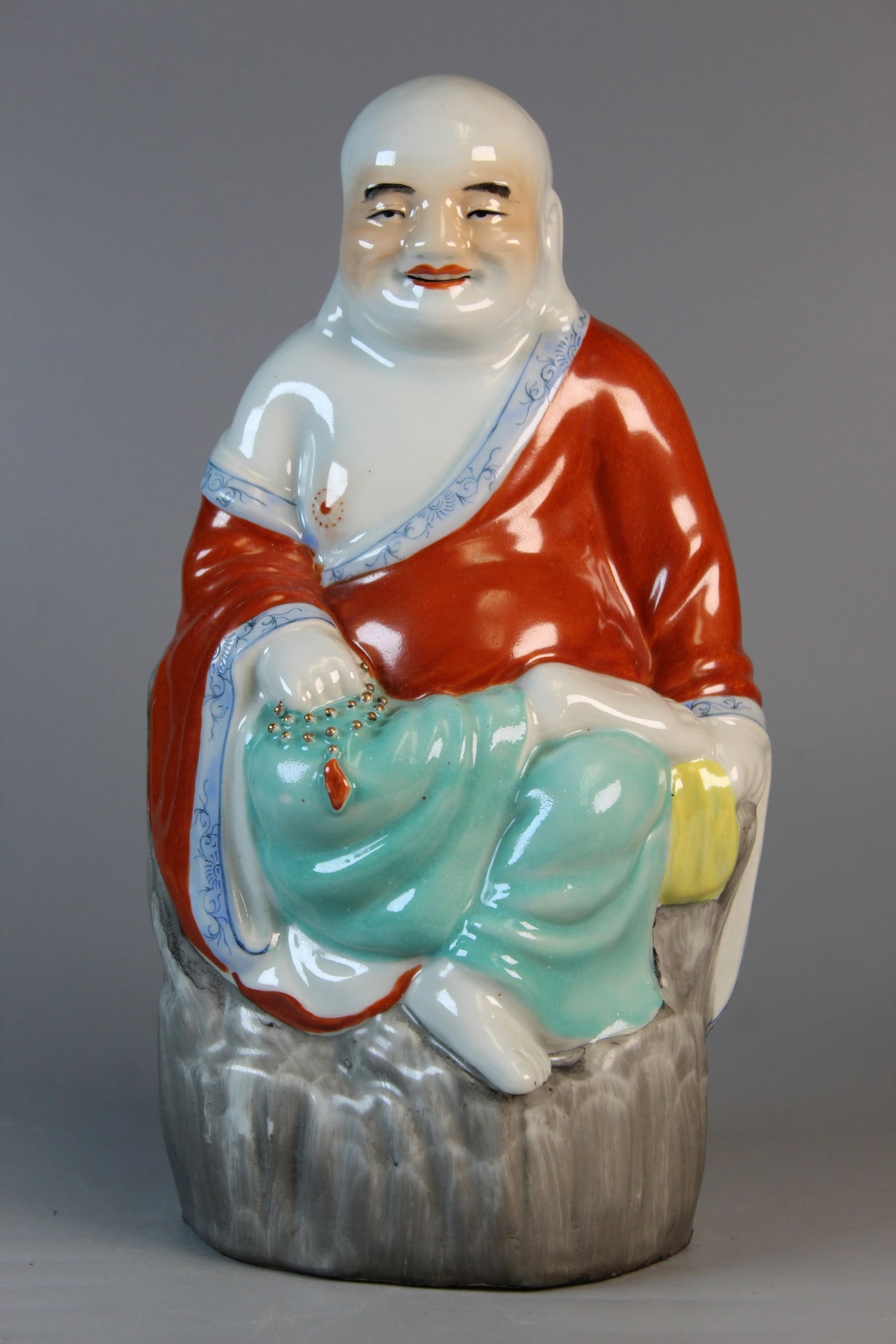Chinese Famille Rose Porcelain Laughing Buddha Statue: Chinese Famille Rose Porcelain Laughing Buddha Statue. H 9.75".
