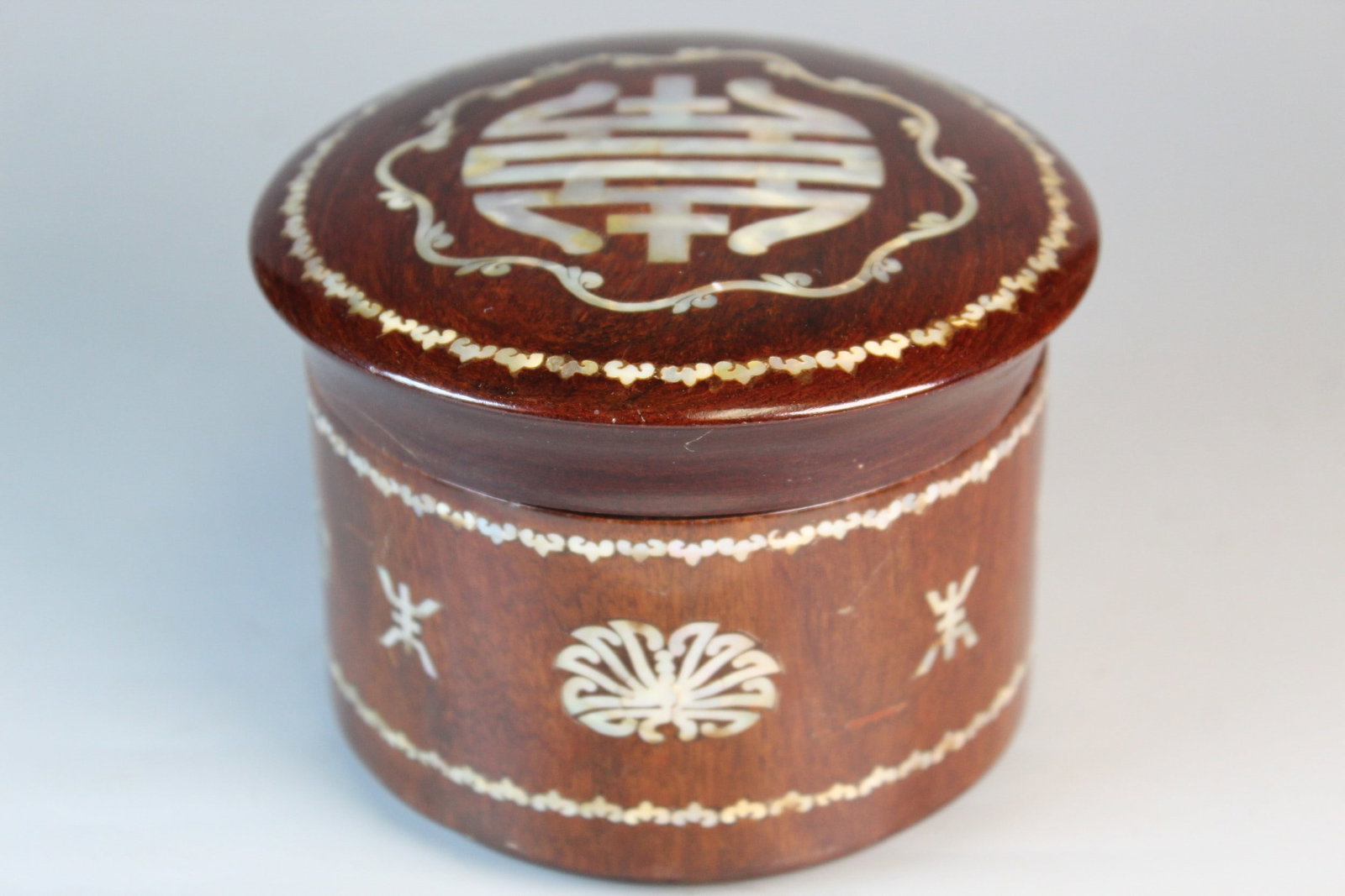 Chinese Wood Box with Mother-of-pearl Inlay Decorations: Chinese Wood Box with Mother-of-pearl Inlay Decorations. Diam 5". H 3.5".