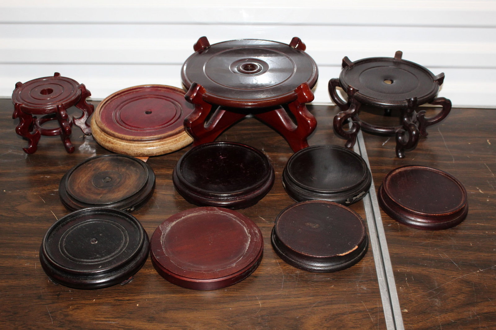 A Group of Asian Wood Stands.: A Group of Asian Wood Stands.. Largest Diam 9.5". H 6".