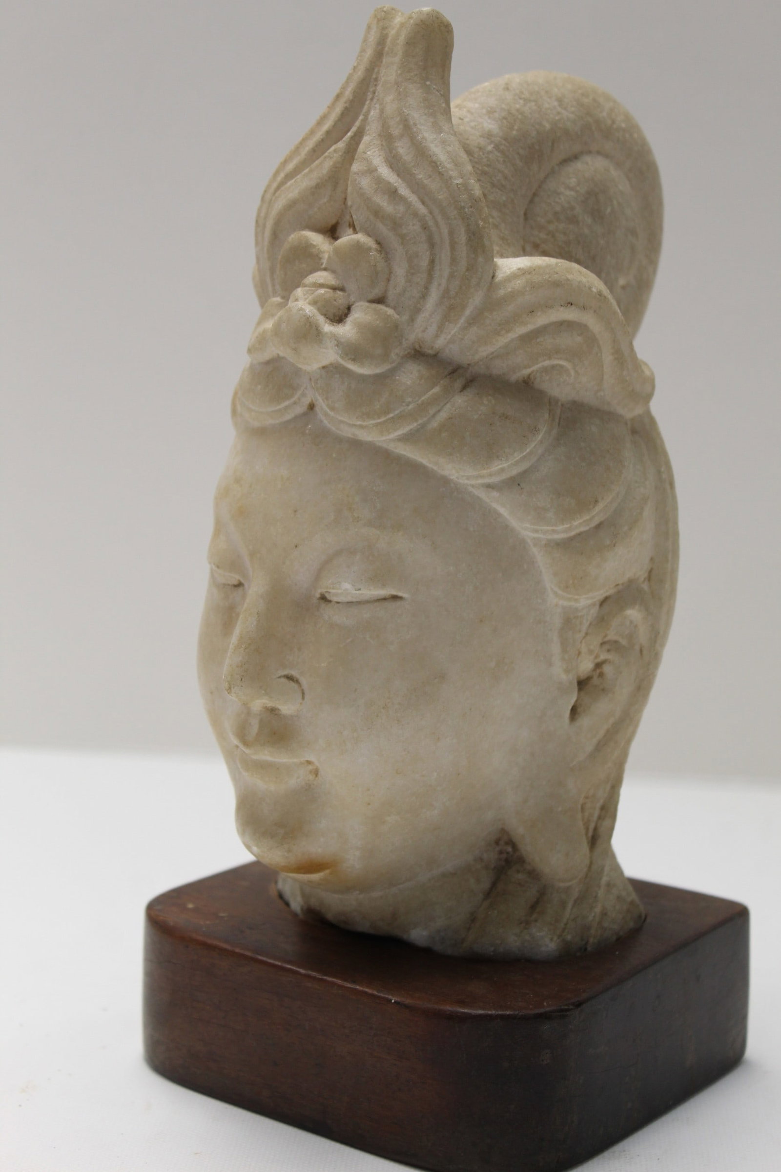 Chinese Carved Stone Guanyin Head: Chinese Carved Stone Guanyin Head. H 9.5". With Stand 11.5".