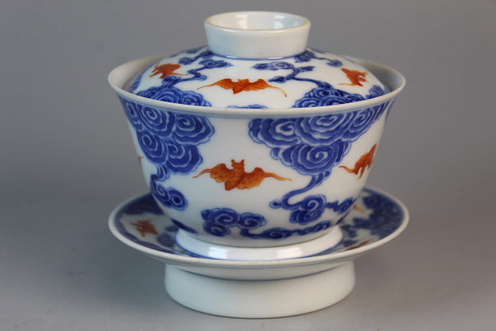 Chinese Blue and White Porcelain Tea Cup on Stand with Iron Red Bats Decorations. (1 of 8)