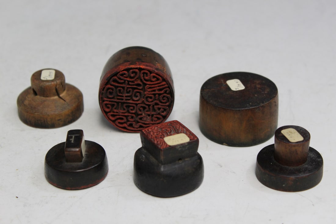Six Antique Chinese Carved Wood Seals: Six Antique Chinese Carved Wood Seals. Largest Diam 1.5".