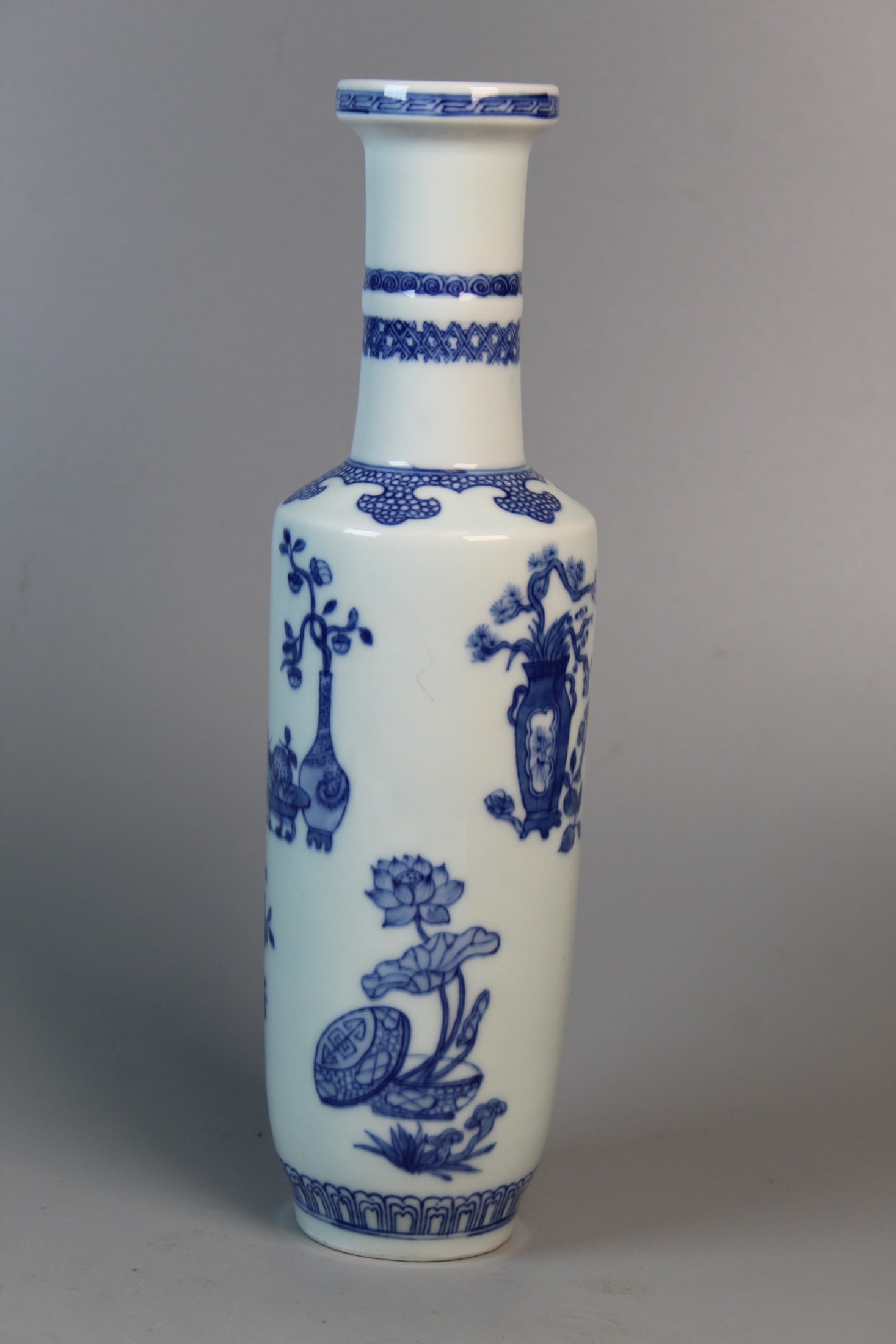 Chinese Blue and White Porcelain Vase: Chinese Blue and White Porcelain Vase. H 10". Diam 2.75".