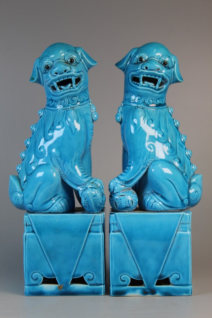 Pair of Chinese Turquoise Glazed Porcelain Foo Dog Figures: Pair of Chinese Turquoise Glazed Porcelain Foo Dog Figures. H 10".